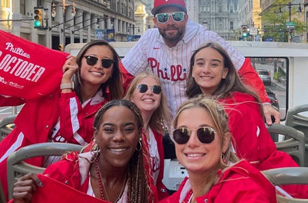 Cailyn Chow, PA-C, with friends in the city dressed to celebrate the Phillies 